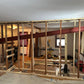Basement Remodel Wood Flooring & Corner Fireplace Tile Wall