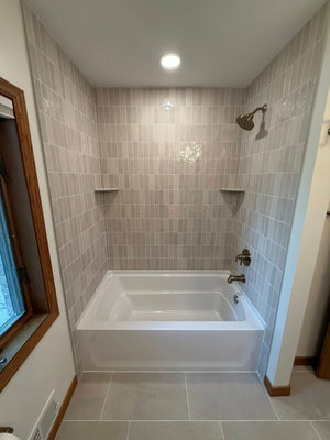 Mix of Mid-century W/ Vertical Patterned Tile Tub Shower Combo