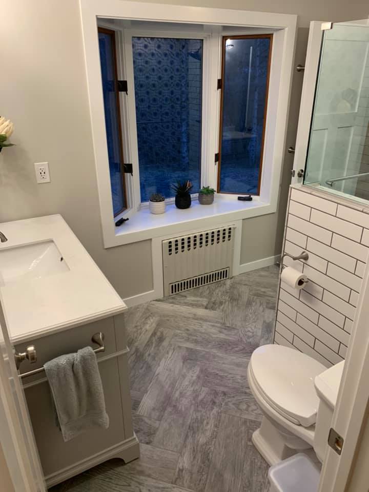 Updated Bathroom - Pattern Shower Tile W/ Herringbone Floor Pattern