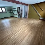 Basement Remodel Metro Remodling Wood Flooring & Corner Fireplace Tile Wall.jpg
