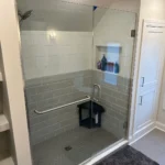 MEtro REmodling Updated Bathroom - Extra Storage Glass Door Shower W: Medium To Large Subway Tile & Large Format Flooring