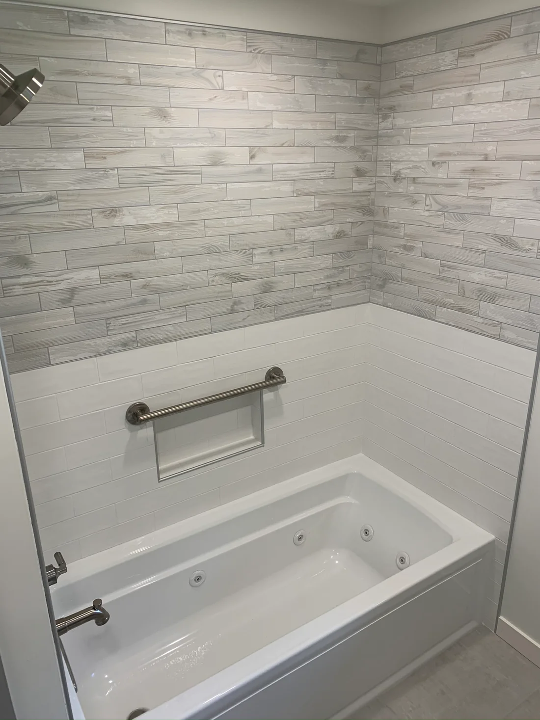Metro REmodling Tub Shower Combo W: Accent Lighting On Wood Appearance Tile5