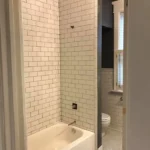 Metro Remodeling Bathroom Update W: Curved Tile Half Wall