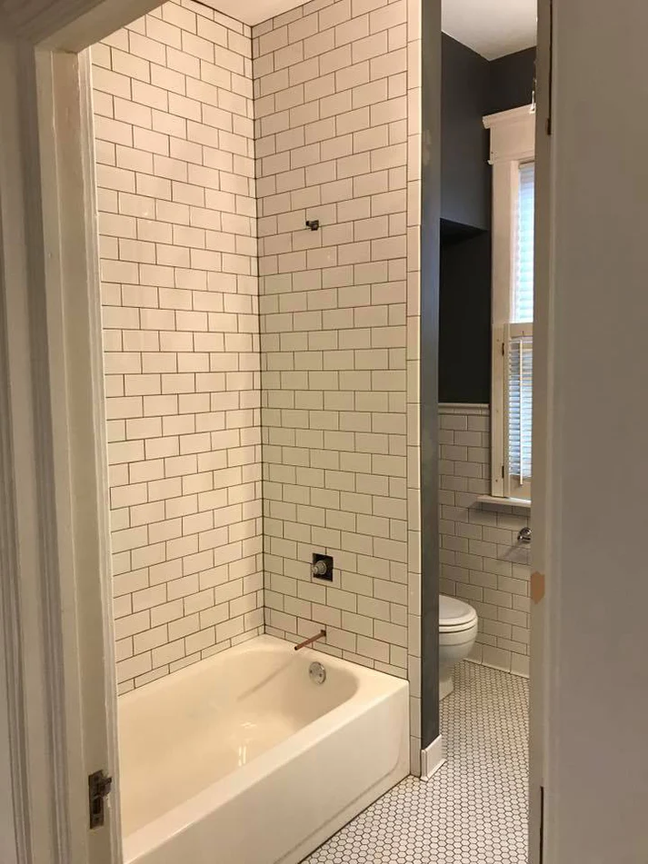 Metro Remodeling Bathroom Update W: Curved Tile Half Wall