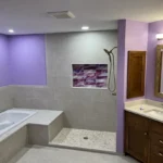 Metro Remodeling Bathroom with accent lighting and a pop of color1