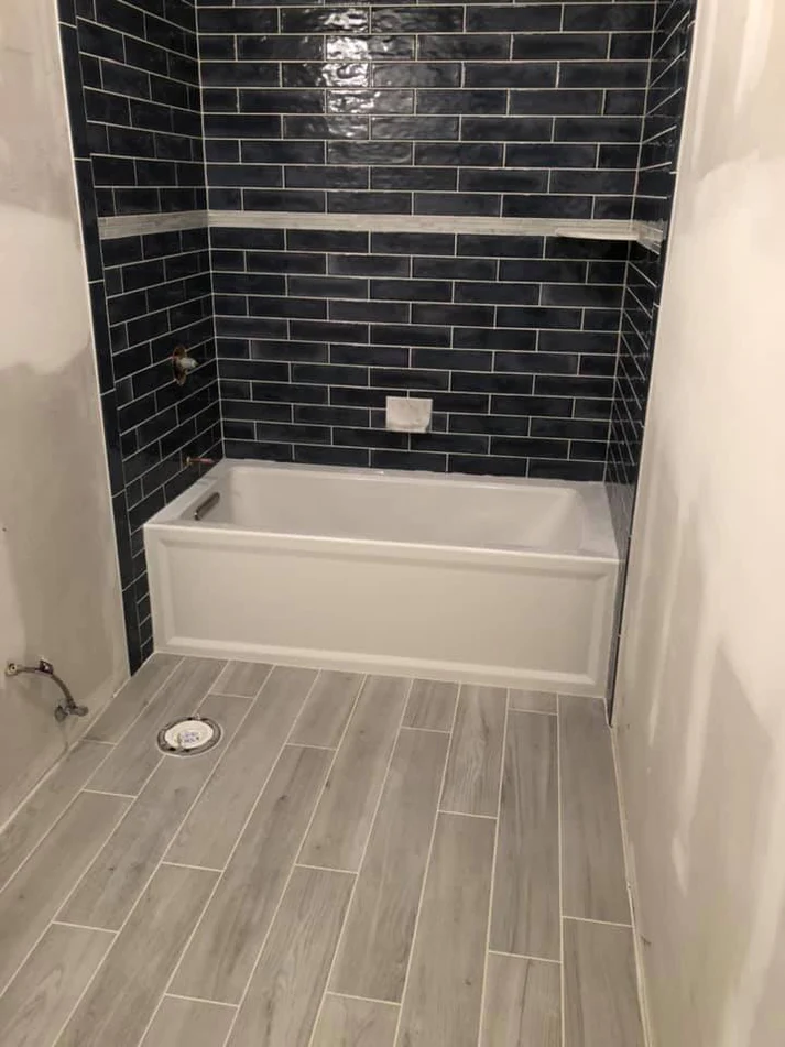 Metro Remodeling Black Subway Tiled Shower Update3