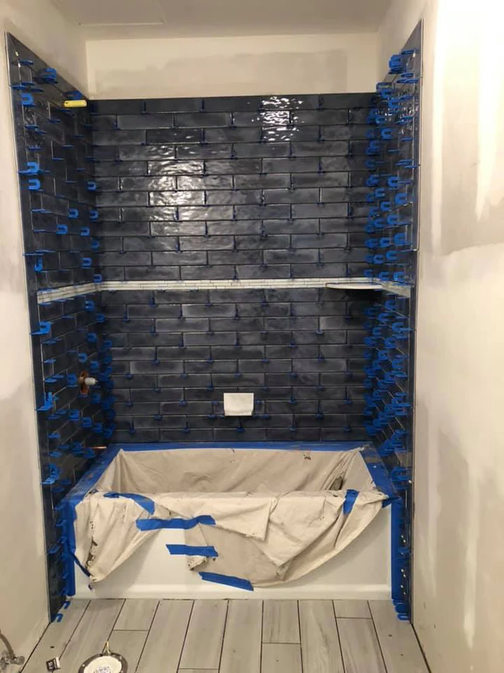 Metro Remodeling Black Subway Tiled Shower Update7