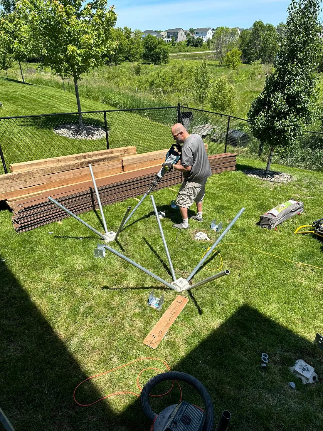 Metro Remodeling Brown Mid-Level Composite Decking W Stairs And Gate12