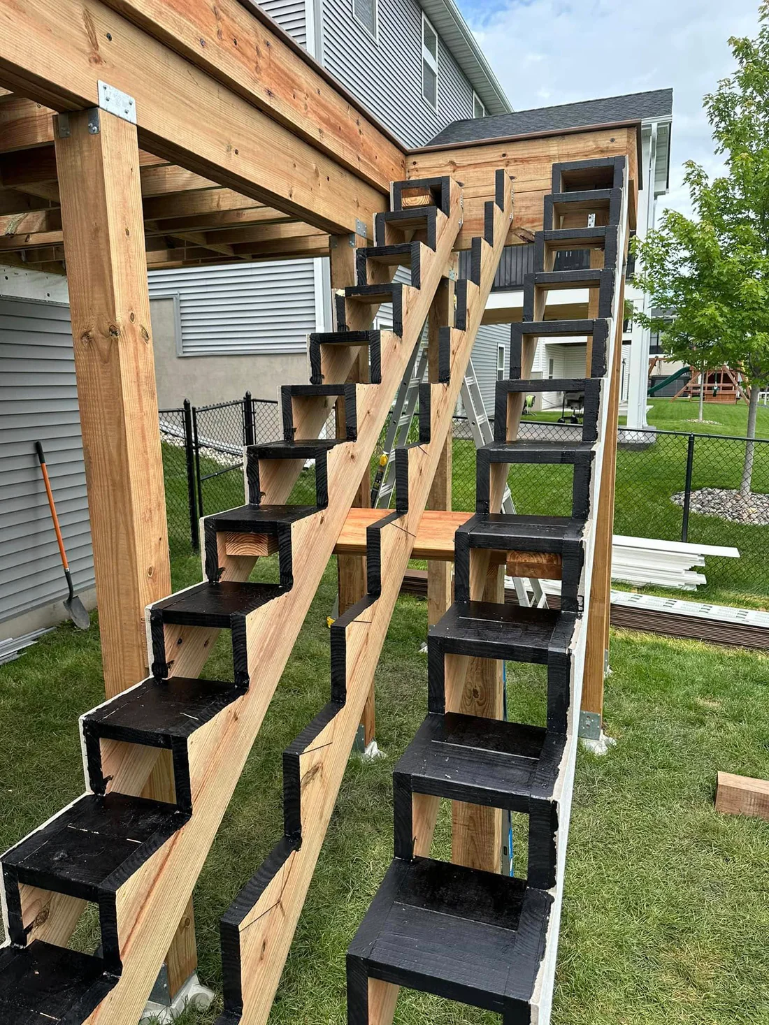 Metro Remodeling Brown Mid-Level Composite Decking W Stairs And Gate8