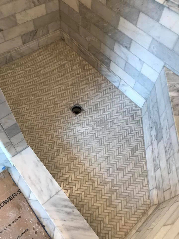 Metro Remodeling Clean Feel W: Custom Herring Bone Inlays And Shower Floor3
