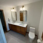 Metro Remodeling Mix of Mid-century W: Vertical Patterned Tile Tub Shower Combo