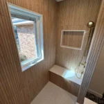 Metro Remodeling Modern Bathroom With Wood Walled Shower