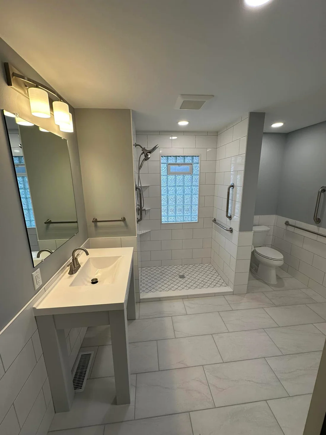 Metro Remodeling Remodeled Ultra Clean Bathroom With Large Tile & Large Format Flooring3