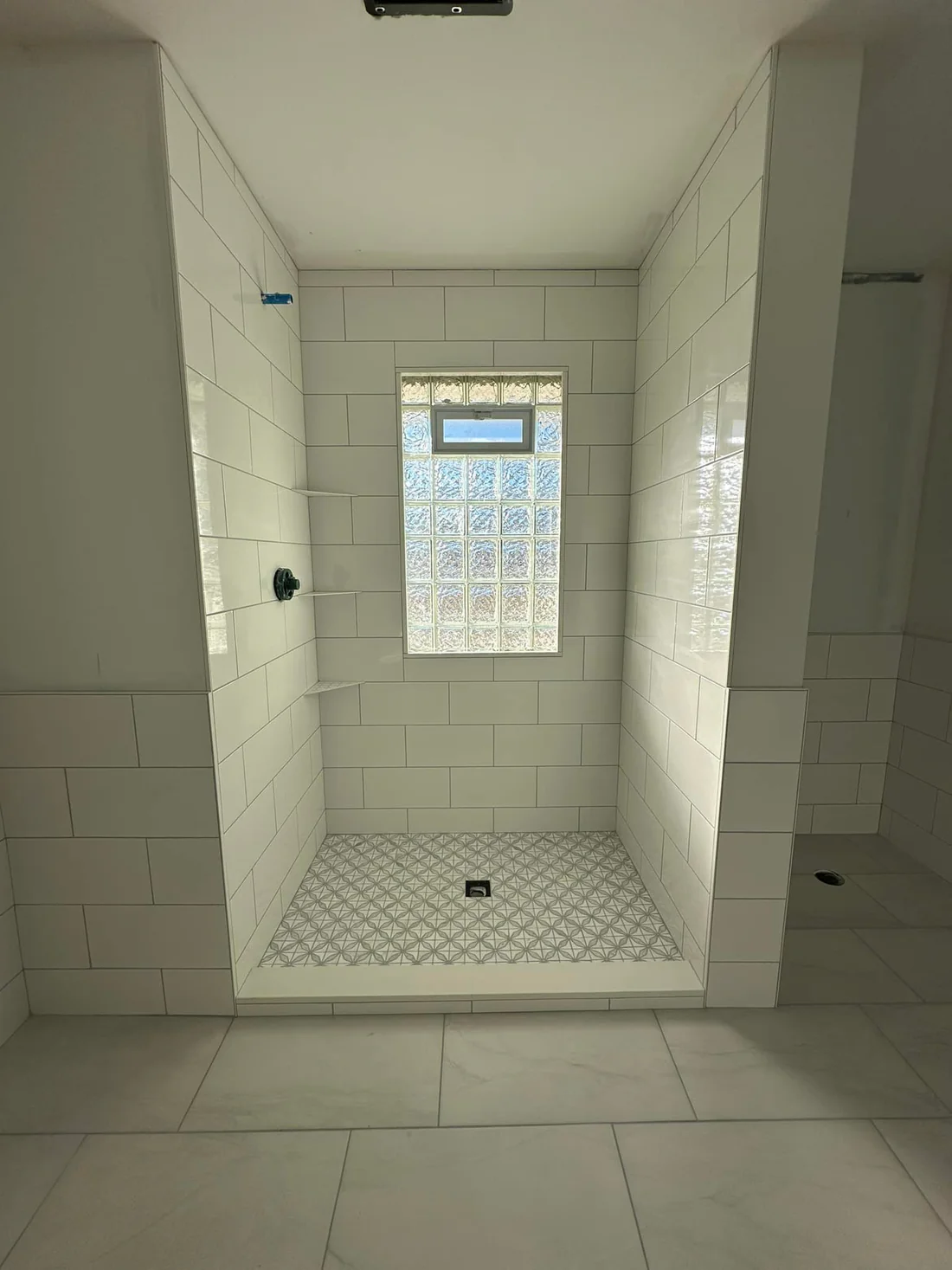 Metro Remodeling Remodeled Ultra Clean Bathroom With Large Tile & Large Format Flooring7