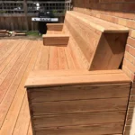 Metro Remodeling Seamlessly Integrated Natural Wood Deck W:Bench Seating