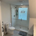 Metro Remodeling Updated Bathroom - Extra Storage Glass Door Shower W: Mini Subway Tile & Large Format Flooring