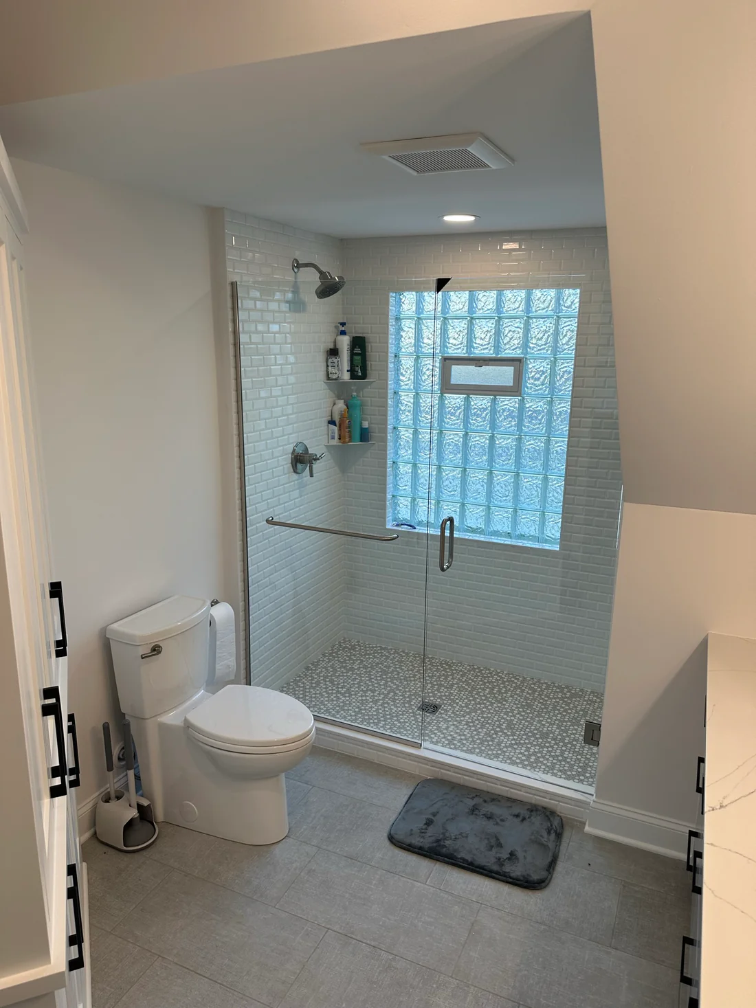 Metro Remodeling Updated Bathroom - Extra Storage Glass Door Shower W: Mini Subway Tile & Large Format Flooring