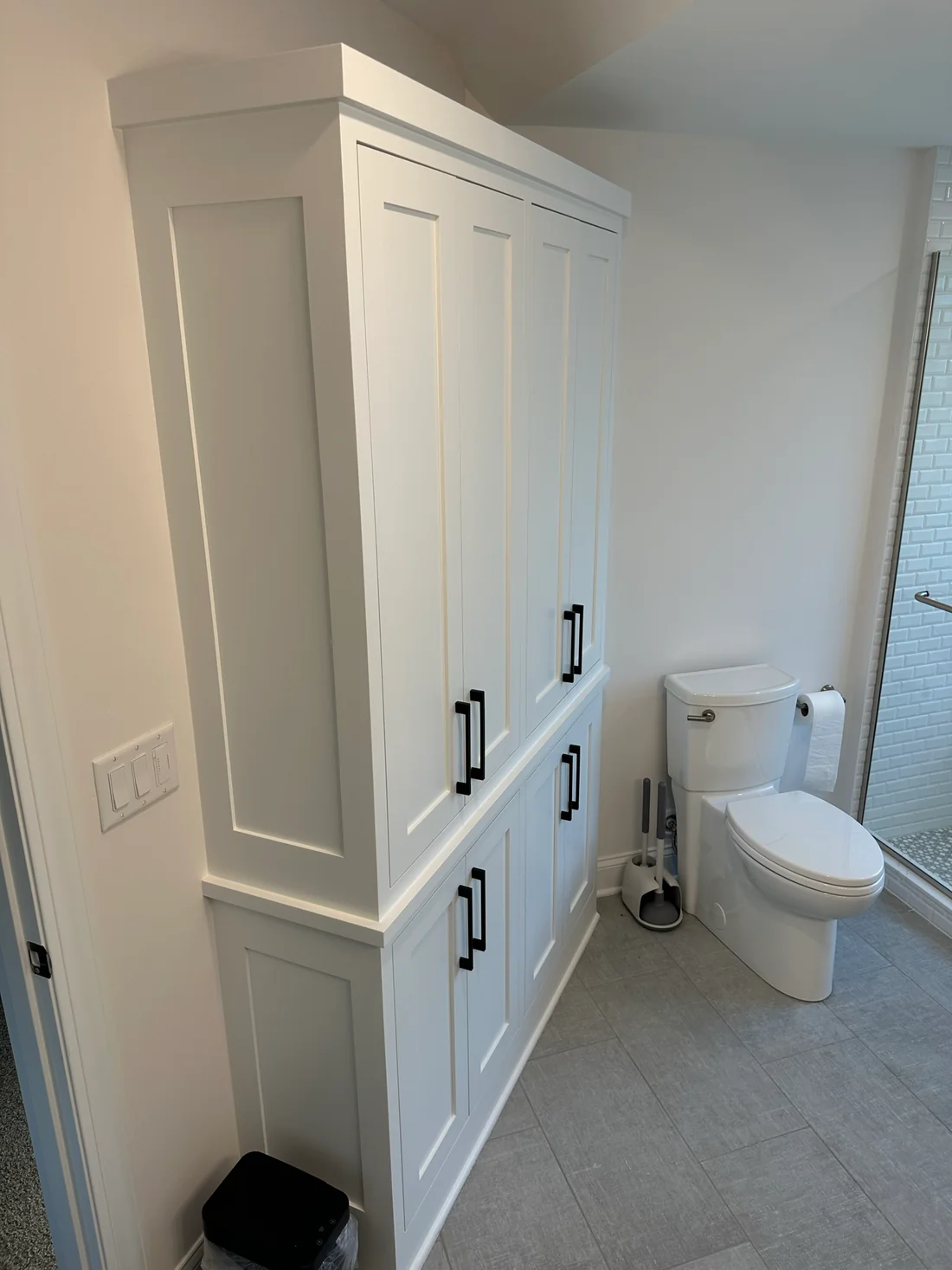 Metro Remodeling Updated Bathroom - Extra Storage Glass Door Shower W: Mini Subway Tile & Large Format Flooring3