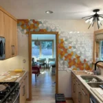 Metro Remodeling Updated Galley Kitchen With Geometric Tile Feature1
