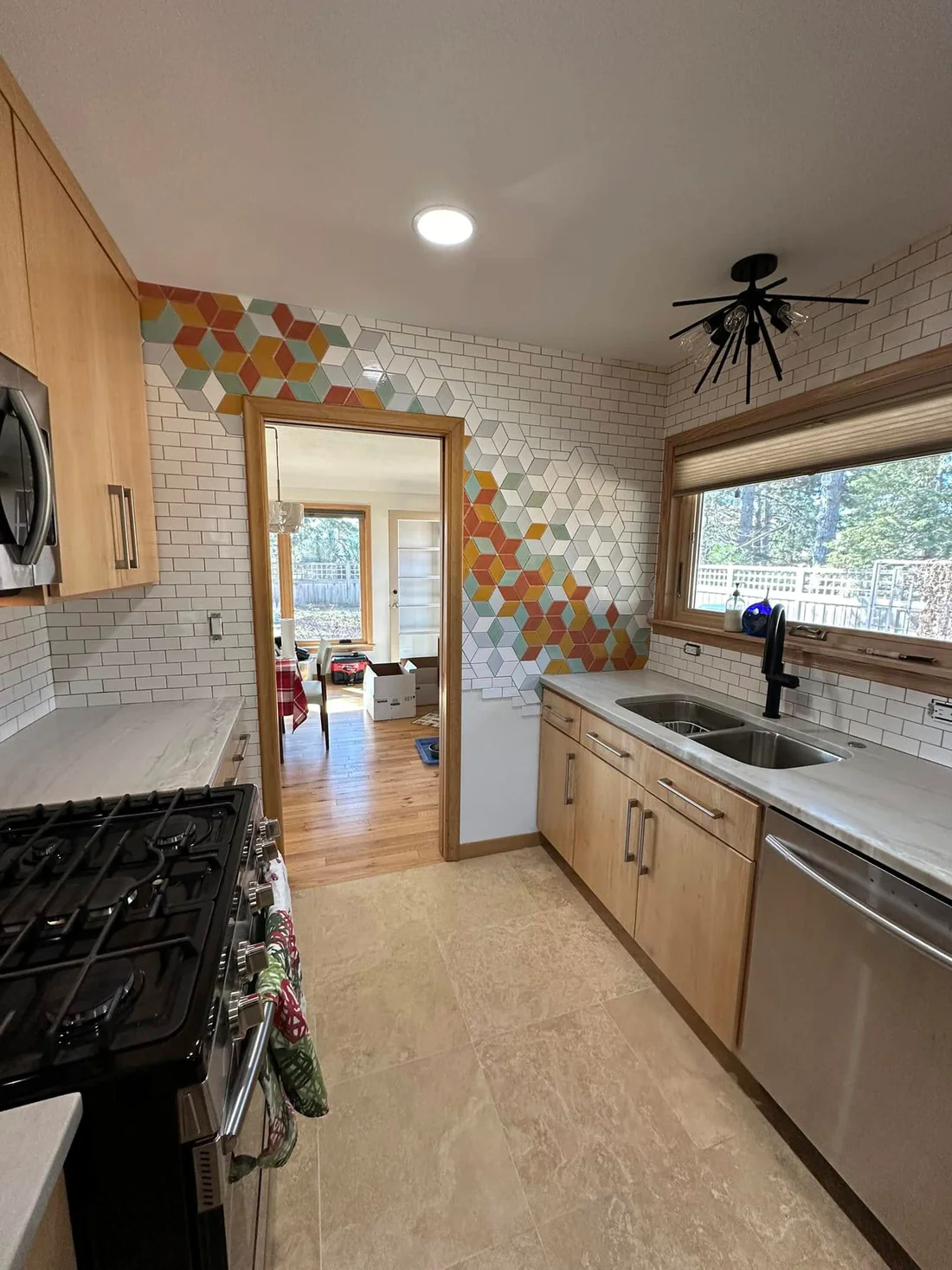 Metro Remodeling Updated Galley Kitchen With Geometric Tile Feature2