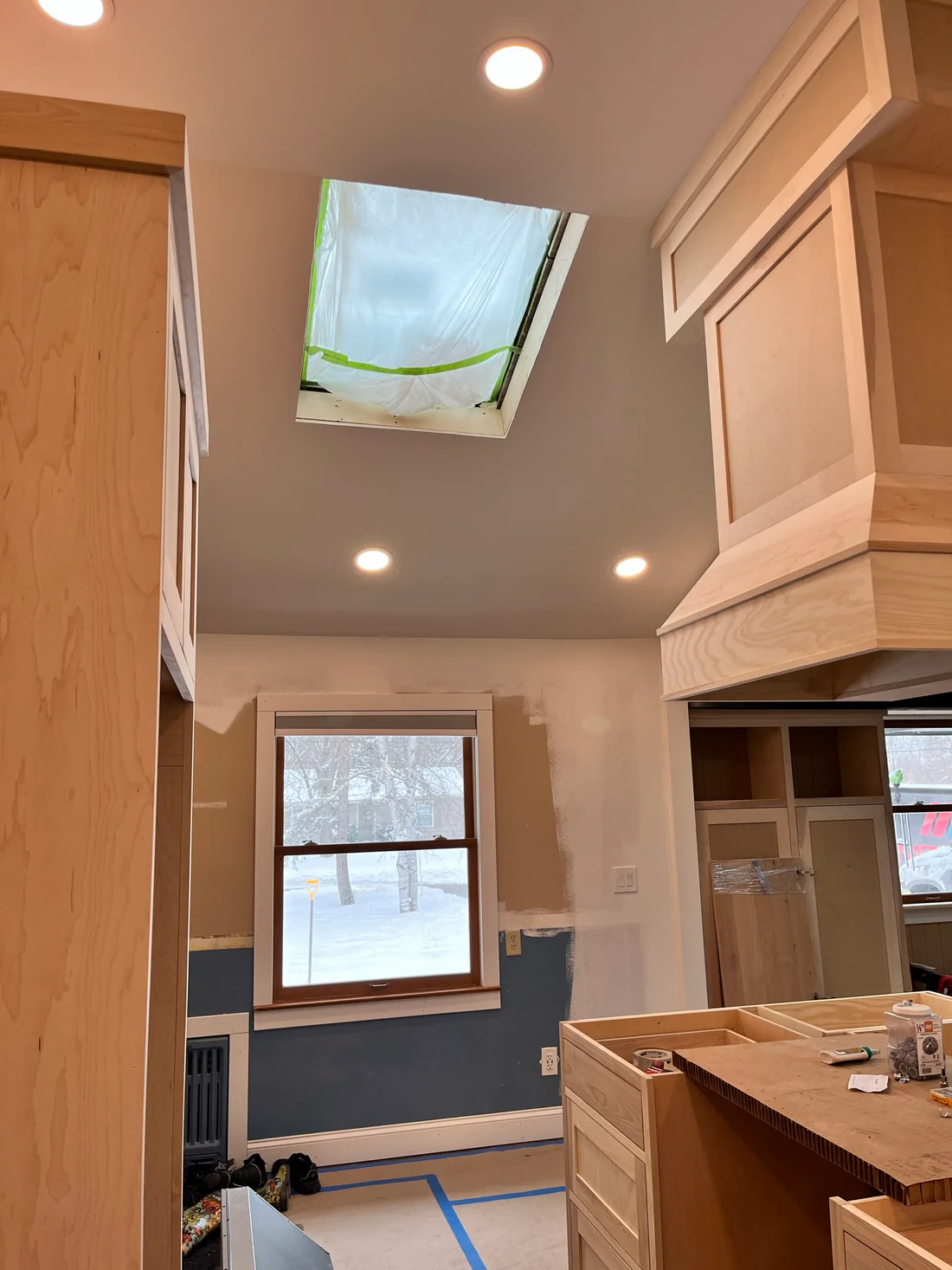 Metro Remodeling Updated Kitchen - Open Concept Vented Range Patterned Tiling11