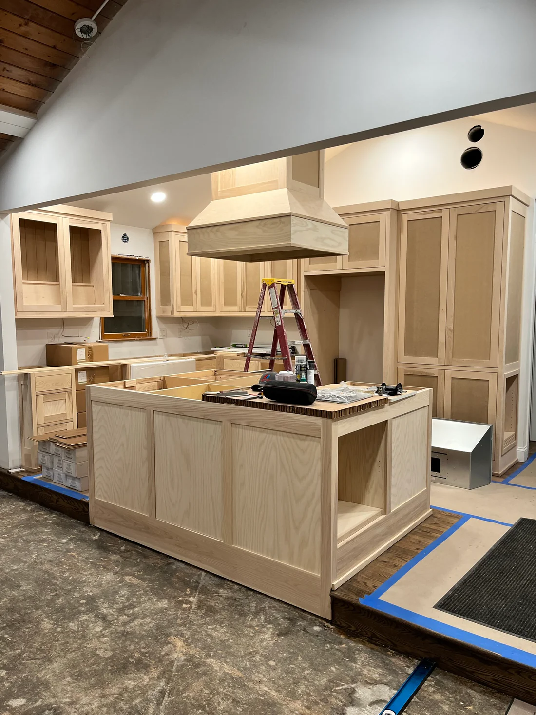Metro Remodeling Updated Kitchen - Open Concept Vented Range Patterned Tiling12