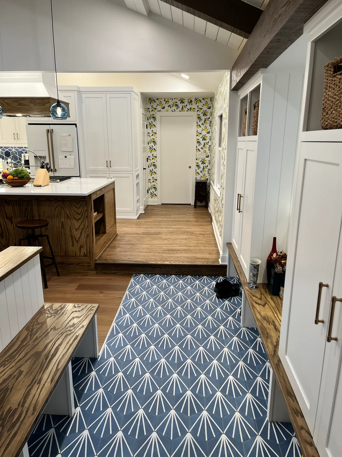 Metro Remodeling Updated Kitchen - Open Concept Vented Range Patterned Tiling16