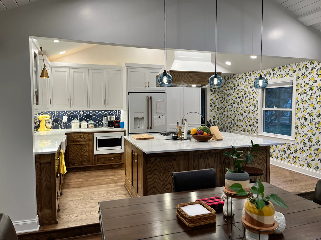 Metro Remodeling Updated Kitchen - Open Concept Vented Range Patterned Tiling8