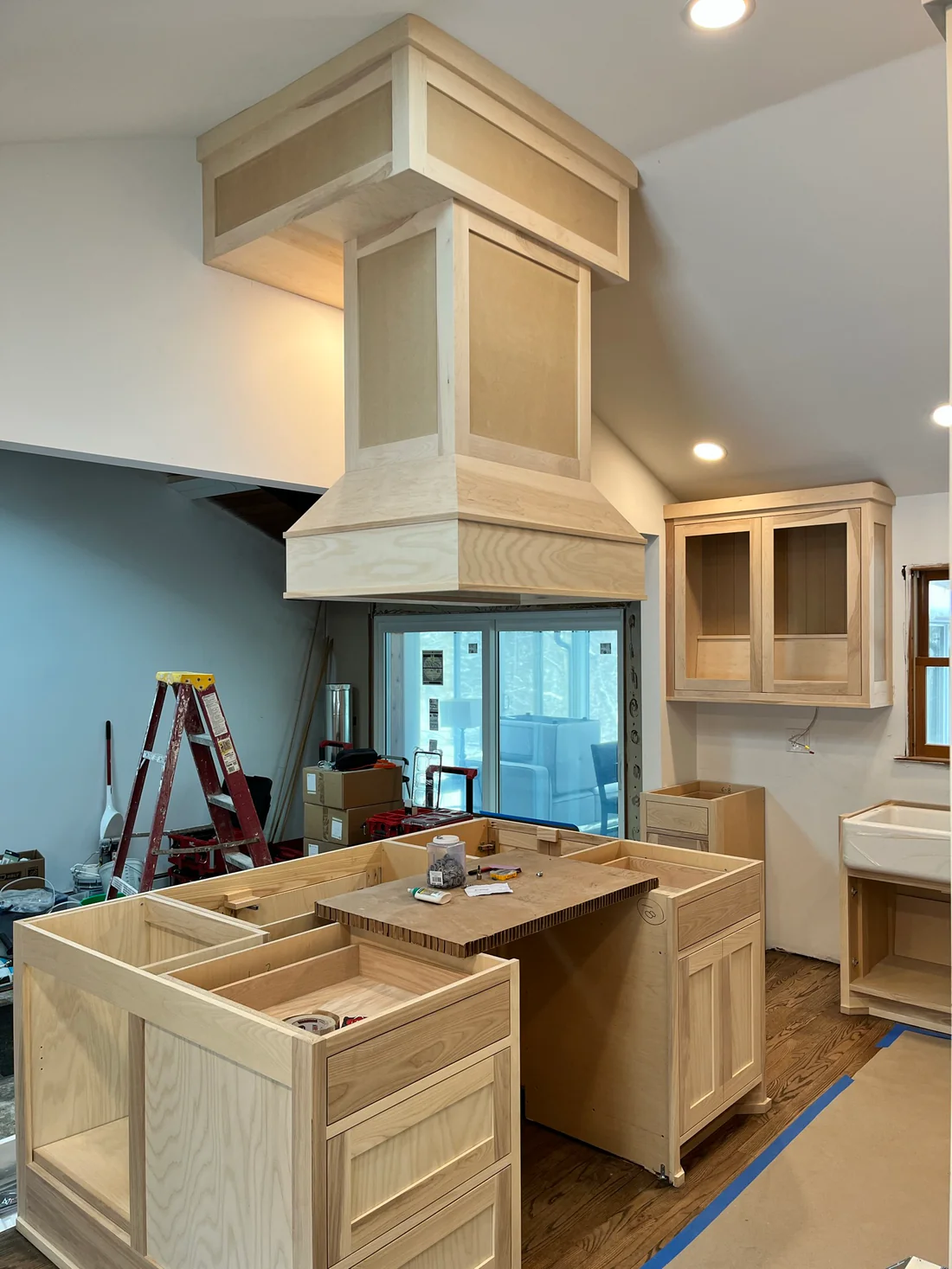 Metro Remodeling Updated Kitchen - Open Concept Vented Range Patterned Tiling9