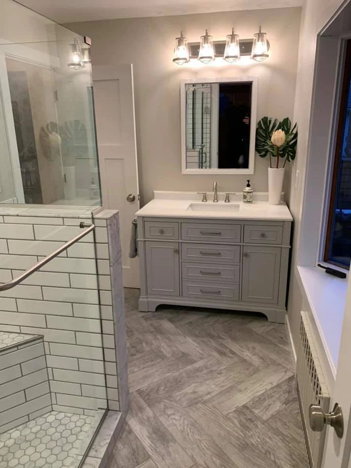 Metro Remodling Updated Bathroom - Pattern Shower Tile W: Herringbone Floor Pattern3