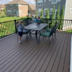 Metro Remodling White & Brown Mid-Level Composite Decking With Stairs