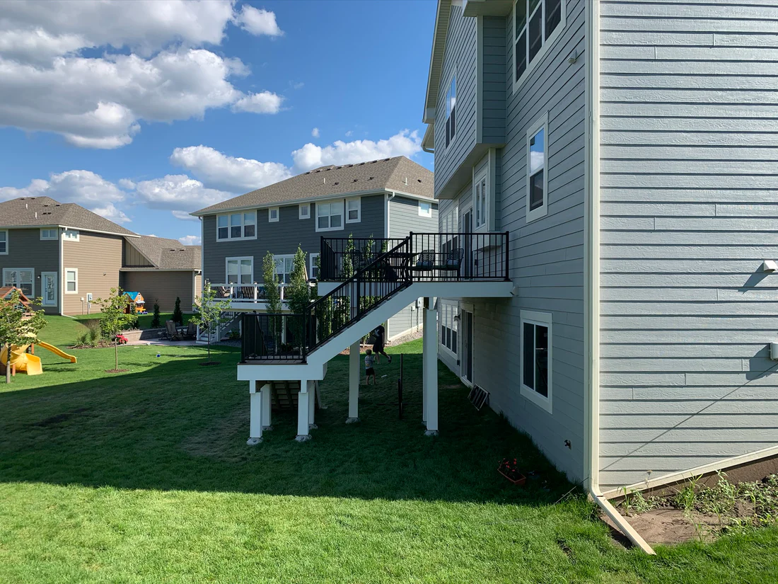 Metro Remodling White & Brown Mid-Level Composite Decking With Stairs3