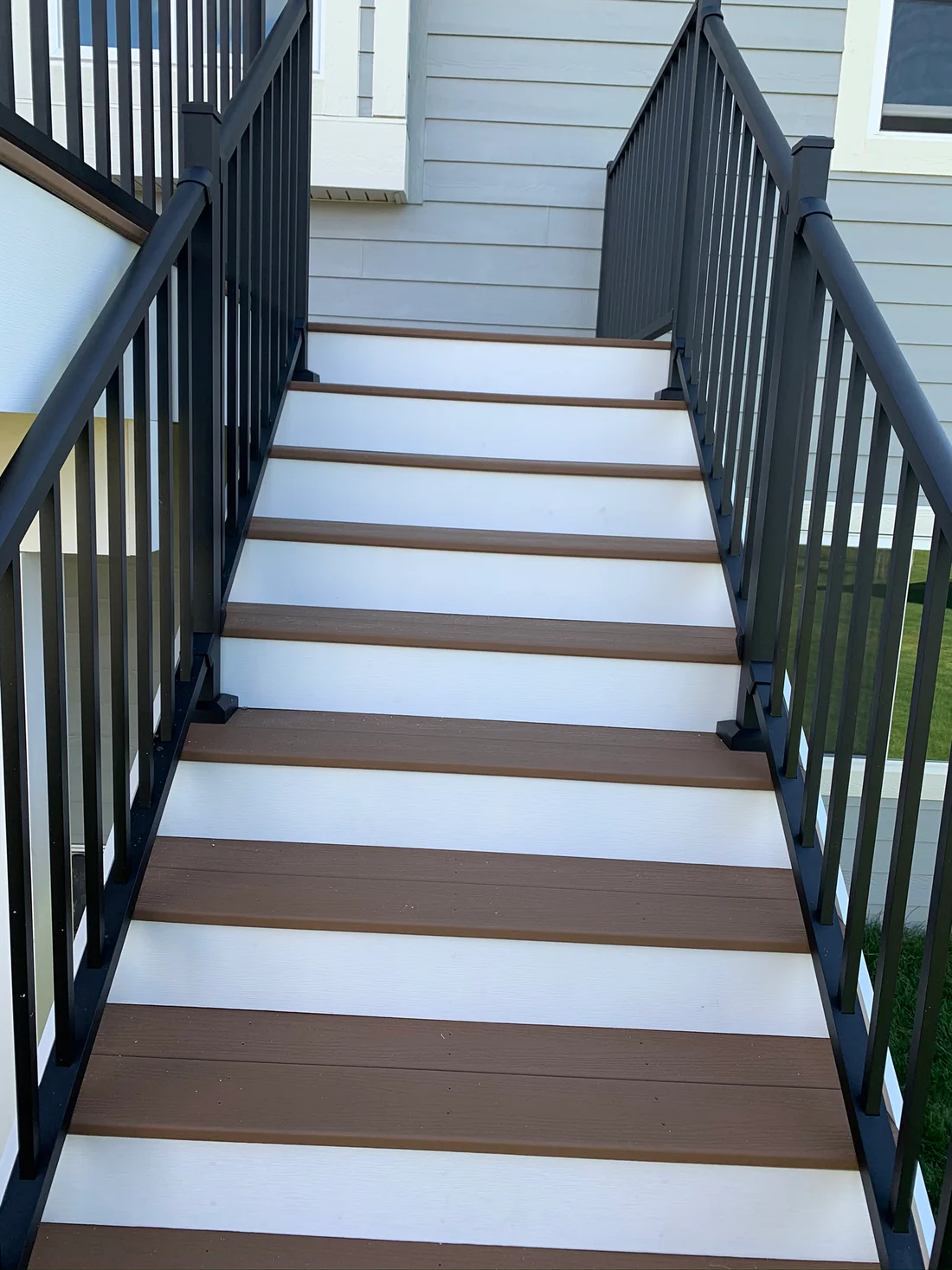 Metro Remodling White & Brown Mid-Level Composite Decking With Stairs5
