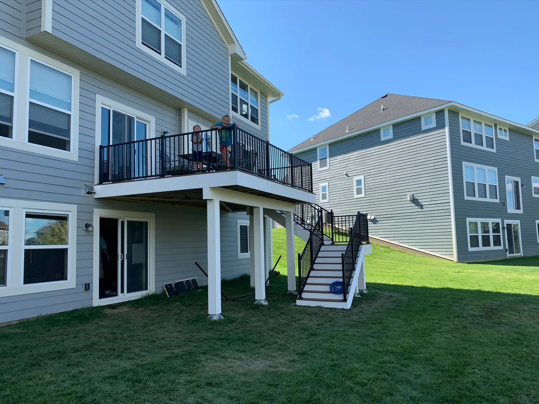 Metro Remodling White & Brown Mid-Level Composite Decking With Stairs7