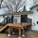 Wood & Black Mid-Level Wood Decking With Stairs