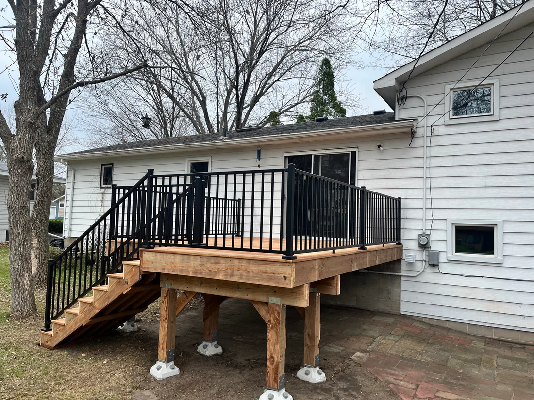 Wood & Black Mid-Level Wood Decking With Stairs