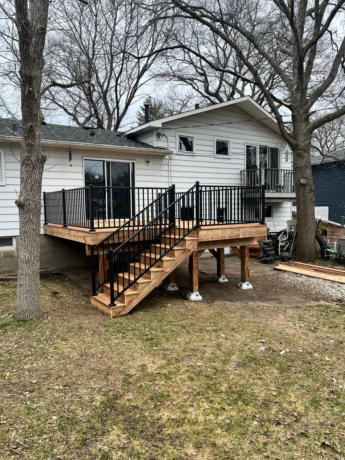 Wood & Black Mid-Level Wood Decking With Stairs4